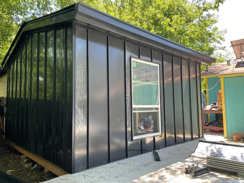 Black standing seam metal wall panels for Metal Roof Installation in Crofton