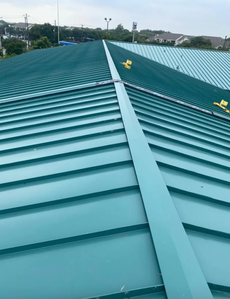 Green commercial metal roof ridge and valley for Metal Roof Repair in Crofton