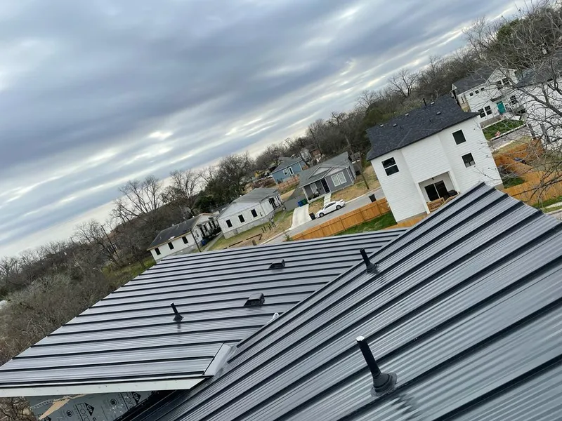 Standing seam metal roof panels with vents for Skylight Repair in Crofton